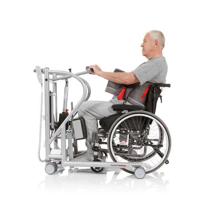 Man using a wheelchair with an assistive device on a white background