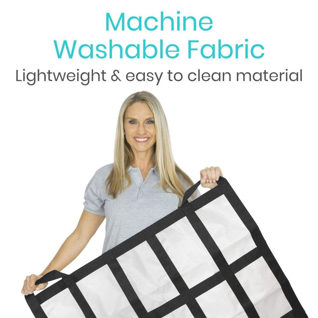 Woman holding a machine washable fabric with text on a white background