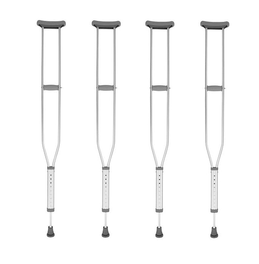 Four pairs of crutches on a white background