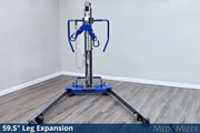 Mechanical leg expansion device on a wooden floor with a gray wall background