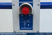 Close-up of a MED MIZER control box showing a red emergency stop button, blue control panel with icons, and silver metal housing.