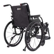 A black manual wheelchair with a padded backrest, shown from a three-quarter rear angle on a plain white background. The backrest features a visible 'drive2 history' logo patch.