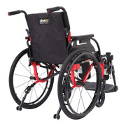 A manual wheelchair with a black fabric seat and backrest, red metal frame components, and black wheels, shown on a clean white background. The brand logo 'drive2 METRY' is visible on the backrest.