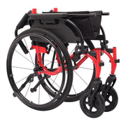 A manual wheelchair with a black fabric seat and backrest, large black wheels, and a bright red metal frame, shown on a plain white background.