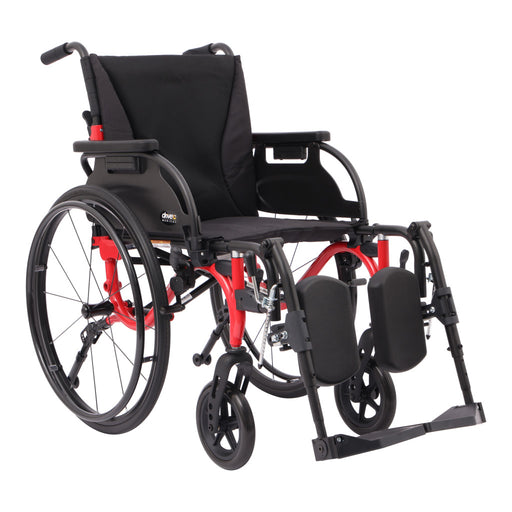 A manual wheelchair with a black fabric seat and backrest, black wheels and armrests, and a red metal frame, shown on a plain white background.