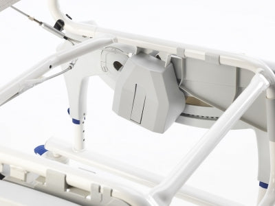 Close-up of a medical bed with control panel on a white background