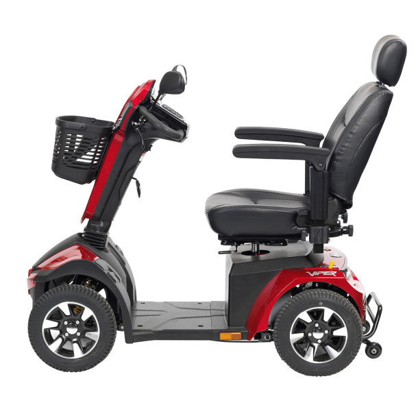 Red and black mobility scooter with a basket on a white background