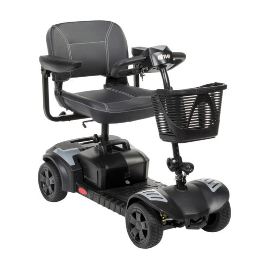 Black mobility scooter with a basket on a white background