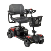 Black and red mobility scooter with a basket on a white background