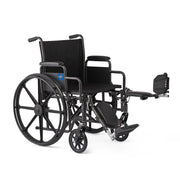 Black wheelchair with extended footrests on a white background