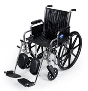 A black and silver manual wheelchair with padded black seat, backrest, armrests, and footrests, shown on a clean white studio background.