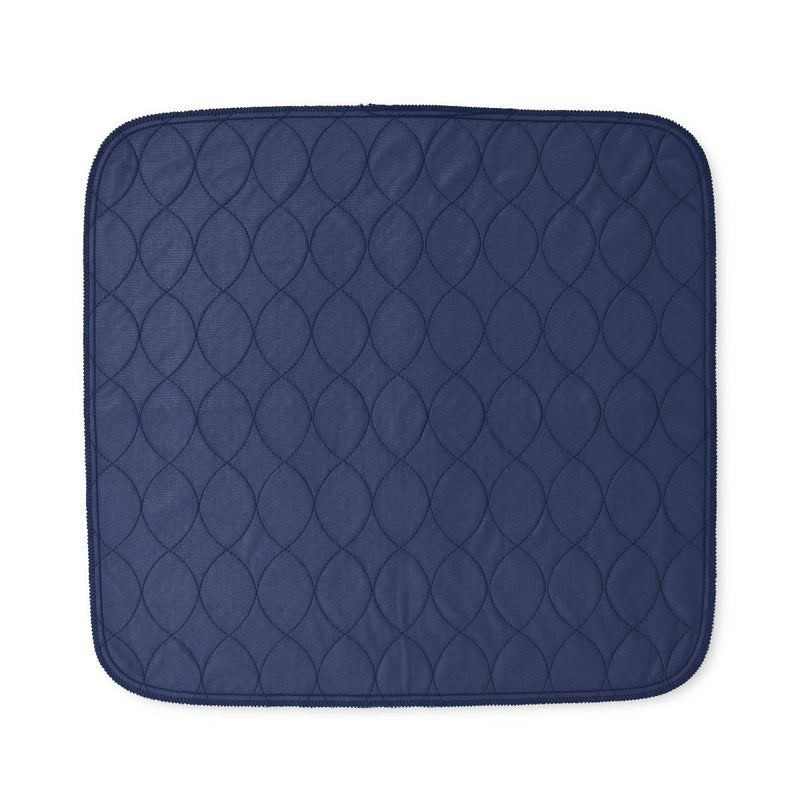 A navy blue quilted mat with a repeating circular stitched pattern, shown flat against a solid white background.