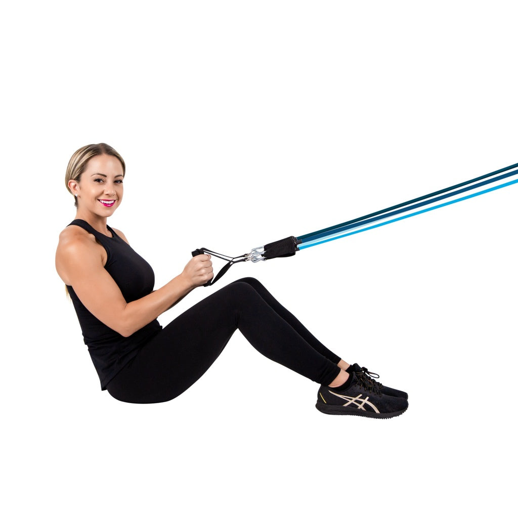 Woman exercising with a resistance band on a white background