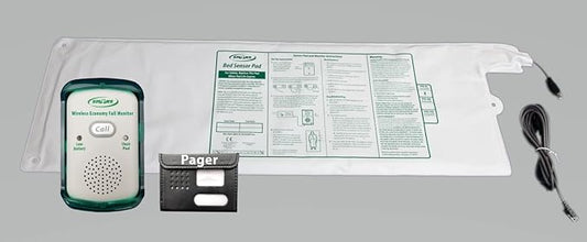 Set of medical equipment including a pager, sensor pad, and cable on a gray background