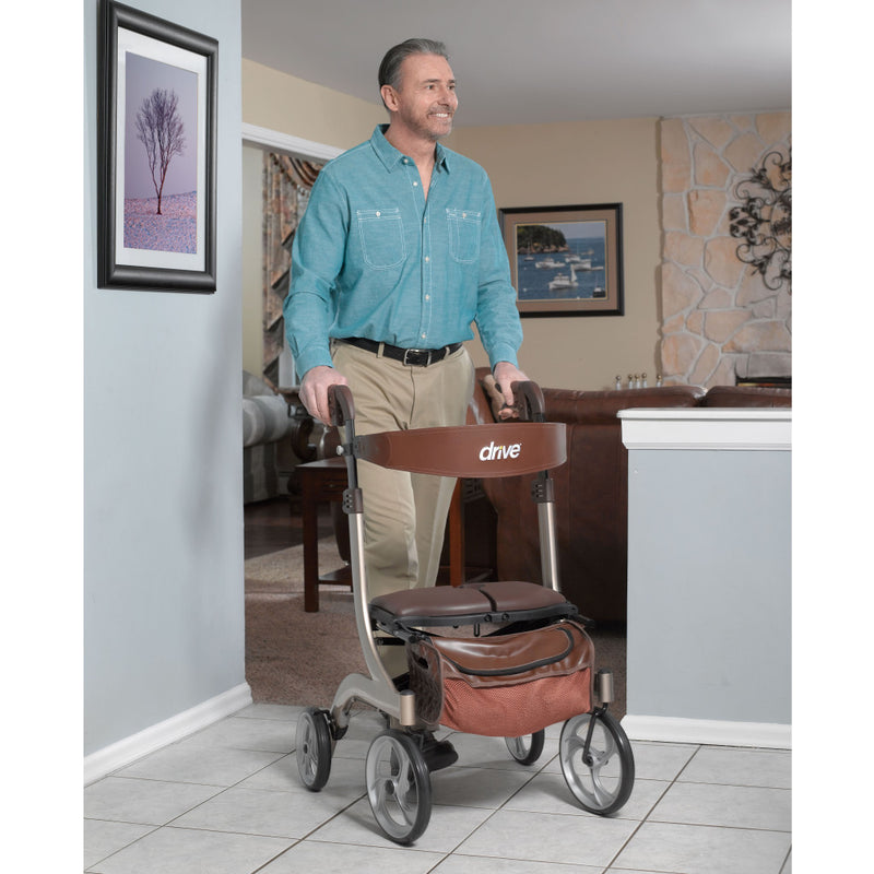 Man using a walker with a seat in a home setting
