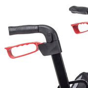 Close-up of a black and red handlebar with a white background