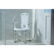 White shower commode chair with adjustable arms in a bathroom setting.