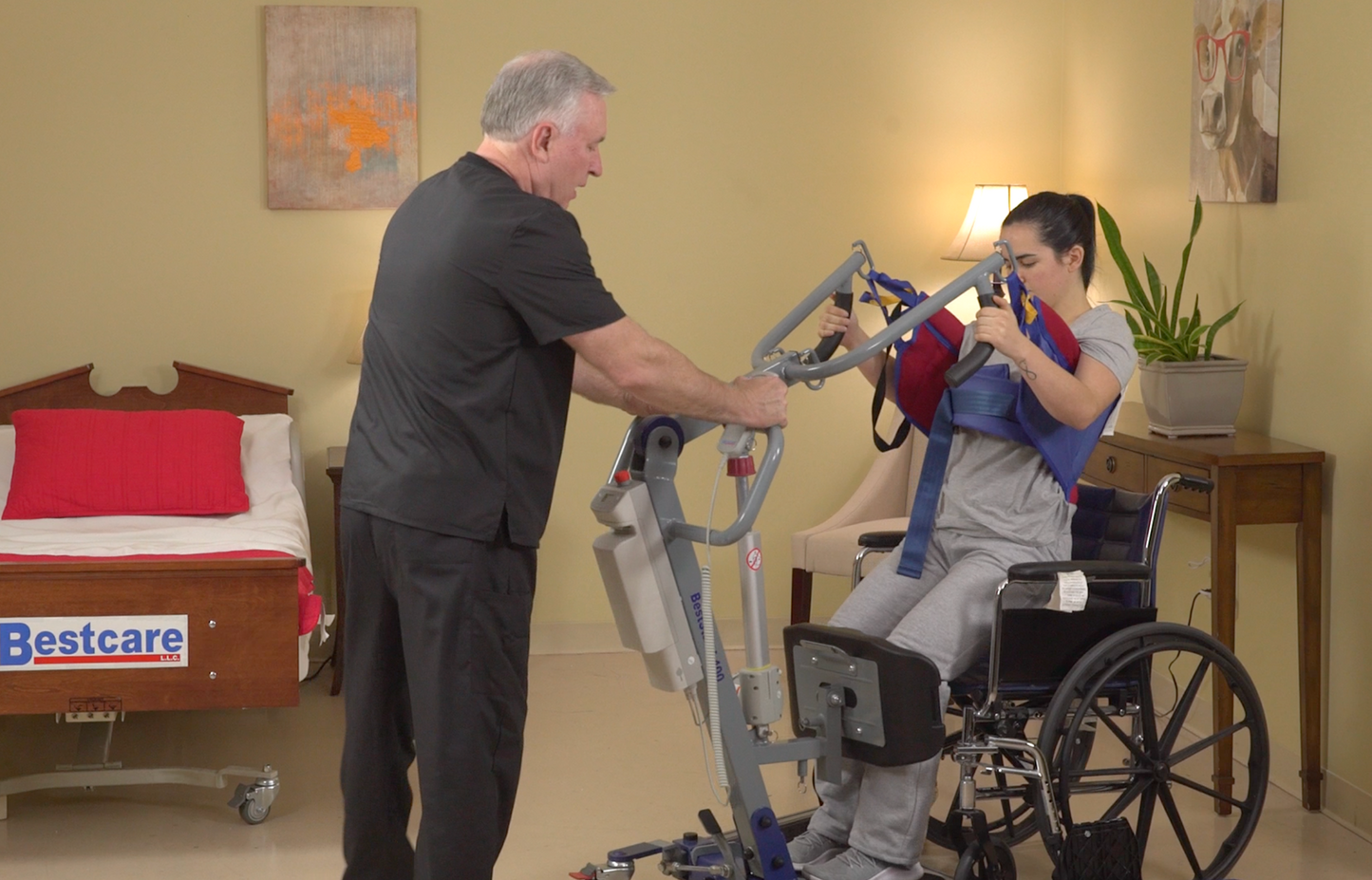 SA400 Patient Lift helping client out of a wheelchair