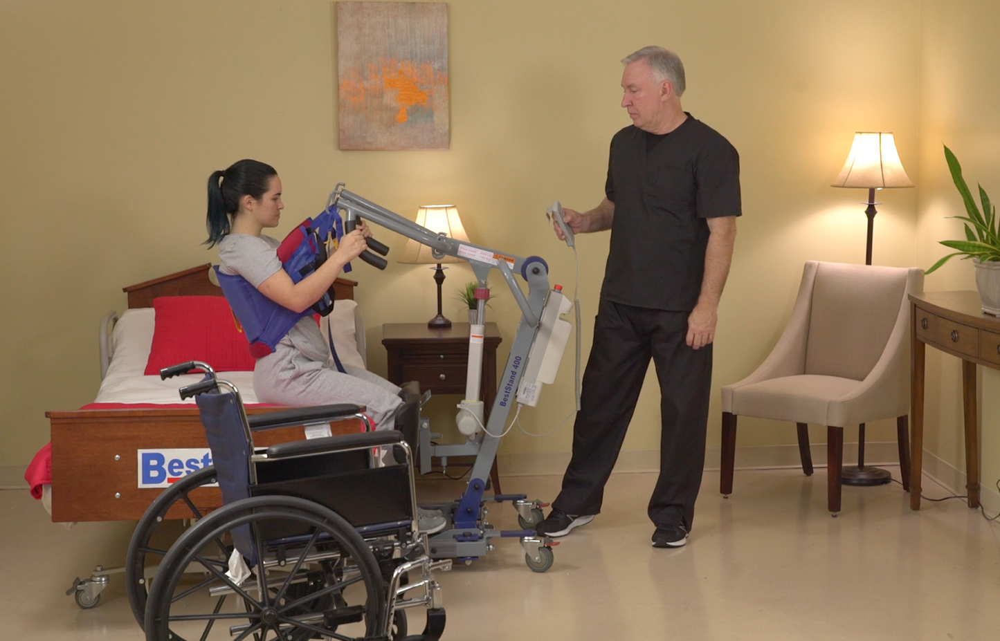 SA400 Patient Lift lifting patient out of the bed