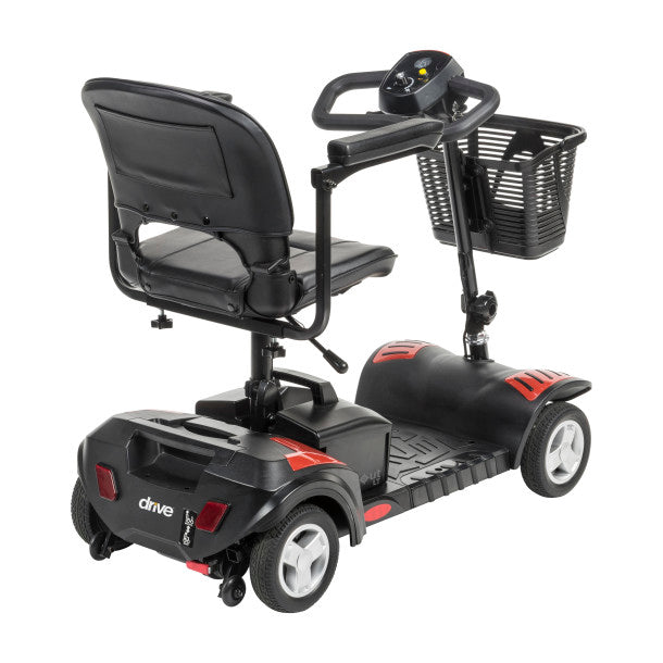 Black mobility scooter with a basket on a white background