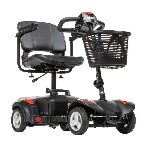 Black mobility scooter with a basket on a white background