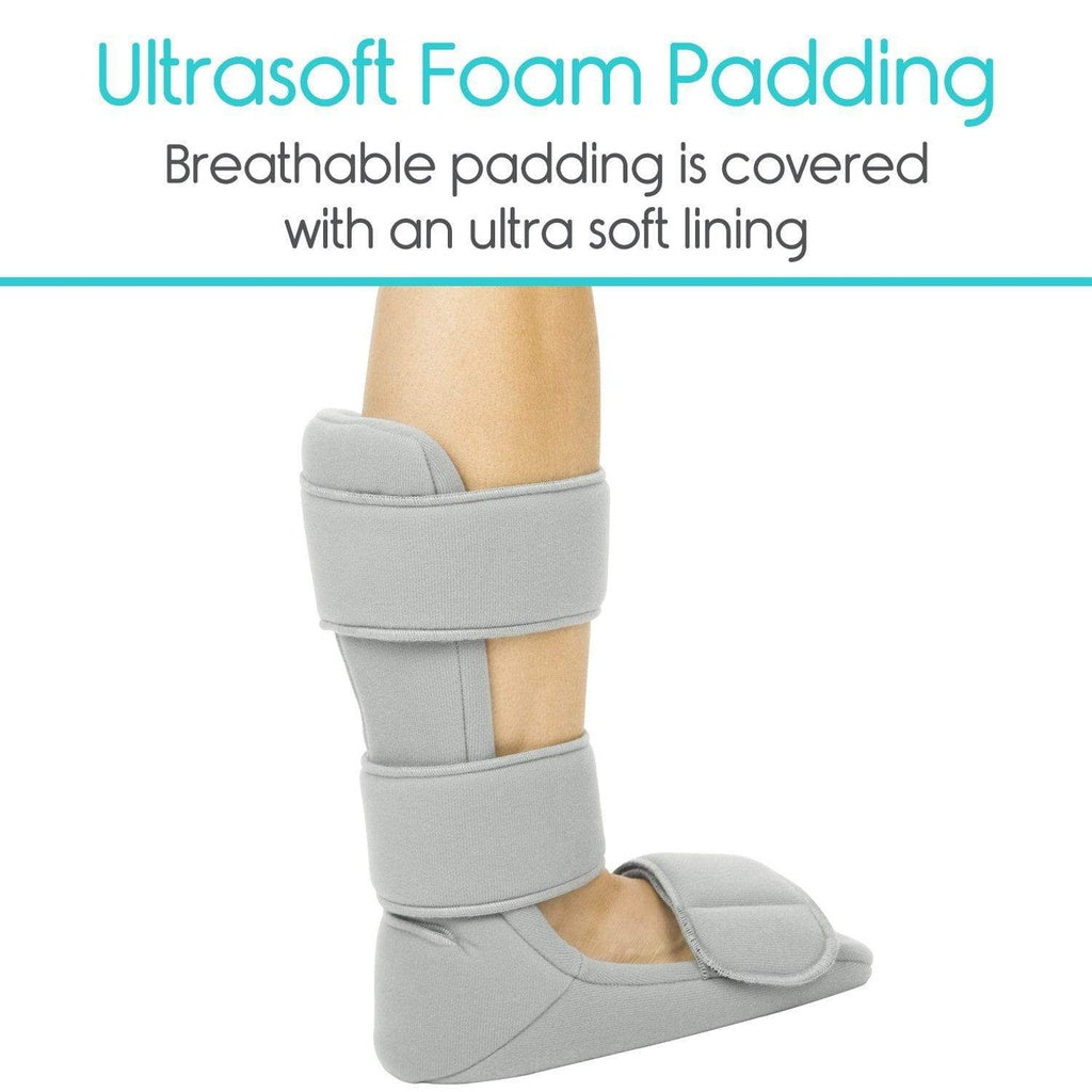 Gray foot and ankle support brace with text about ultrasoft foam padding on a white background