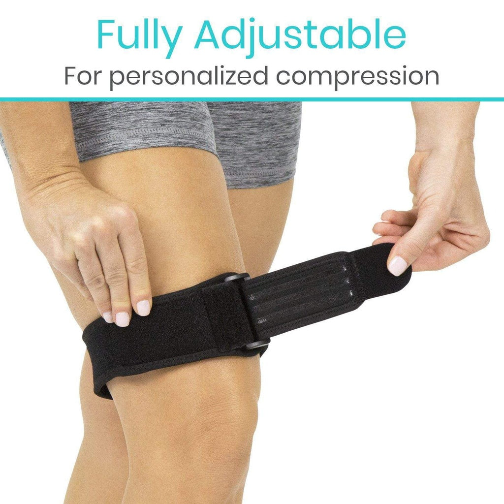 Person adjusting a black compression band on their knee with text 'Fully Adjustable For personalized compression' above.