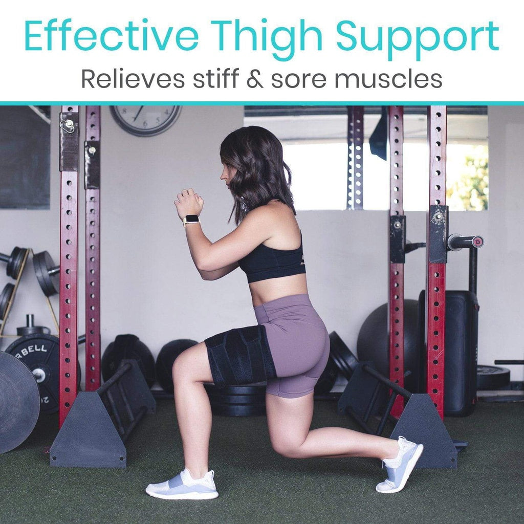 Woman exercising with thigh support in a gym setting