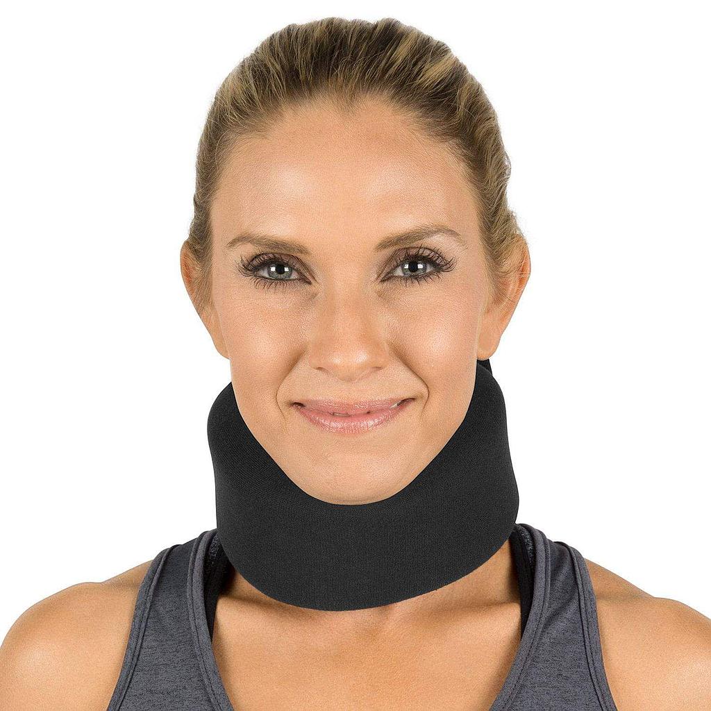 Woman wearing a black neck brace against a white background