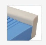 Close-up of a blue and off-white plastic corner trim or edge piece on a white background.