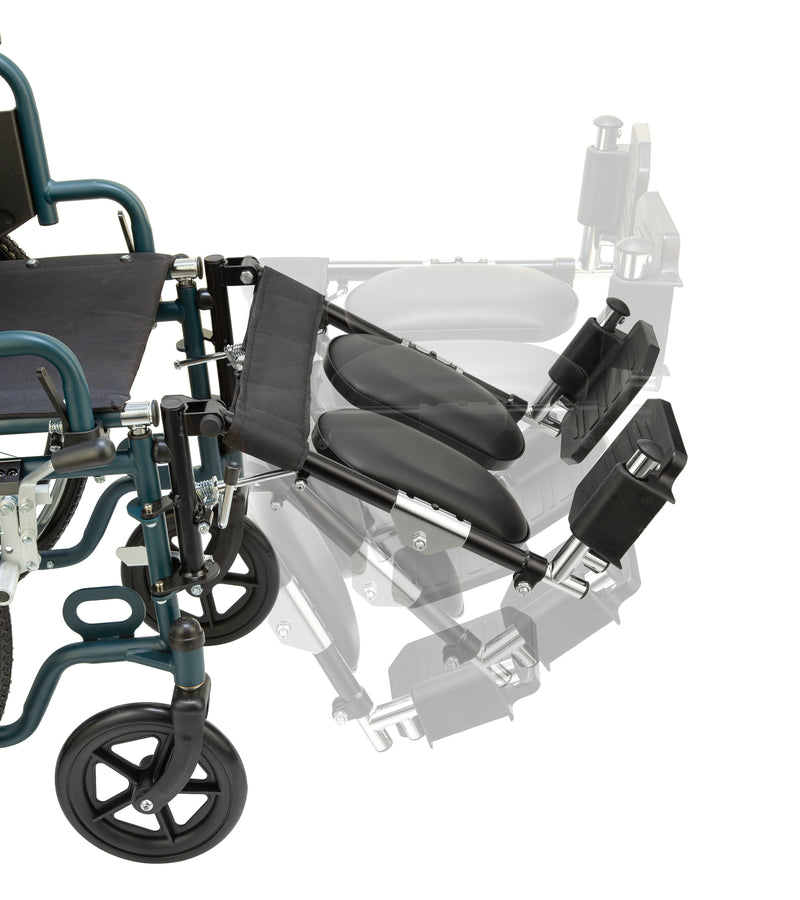 A close-up studio shot of a wheelchair with black padded armrests and footrests, shown against a white background with a faint ghosted secondary view behind it.