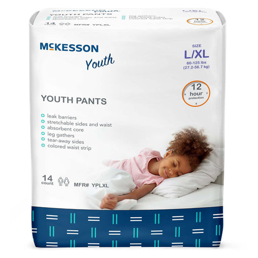 Package of McKesson Youth Pants with a child lying on a bed on the packaging.