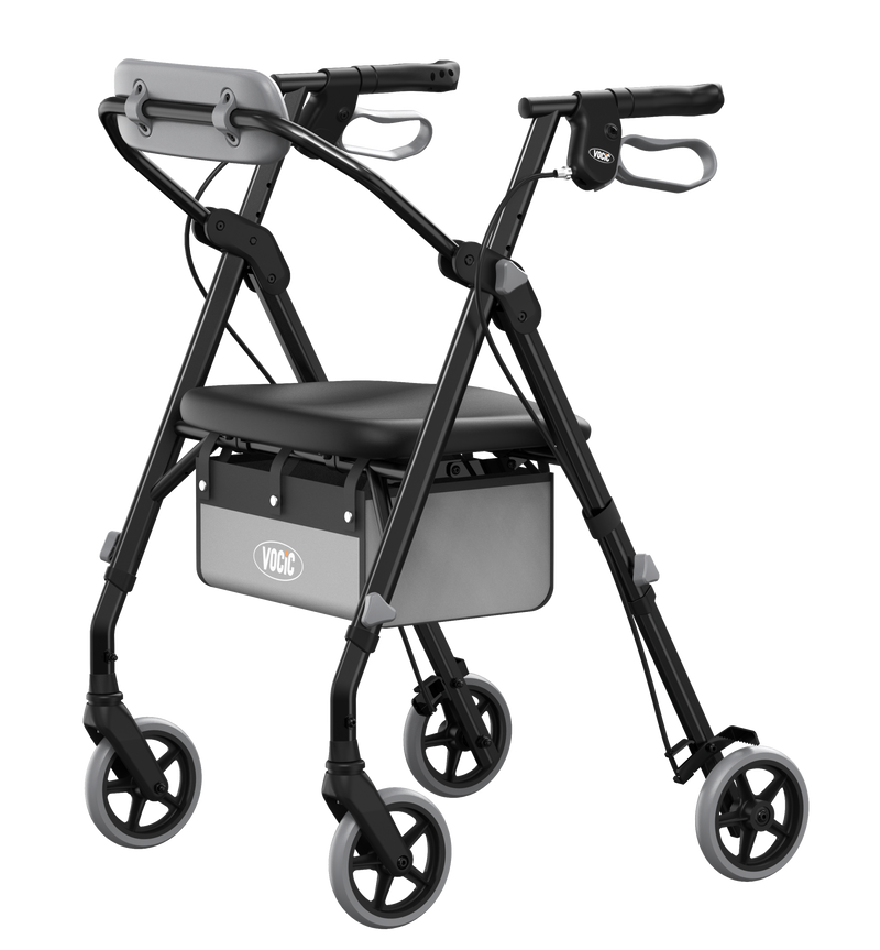 A black and gray rollator walker with a seat, four wheels, and a storage basket, shown on a plain white background.