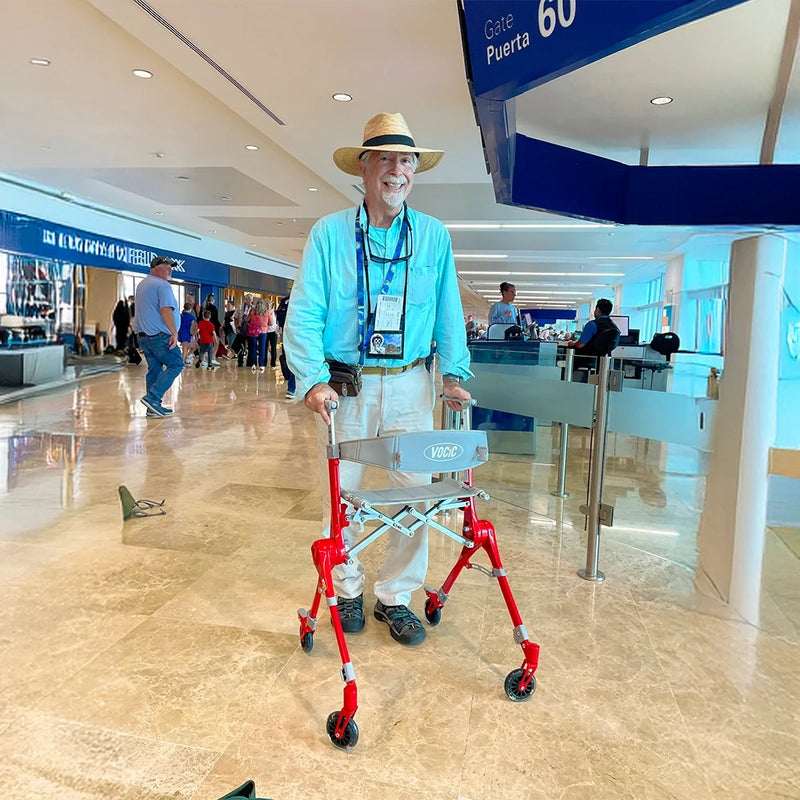 man using a rollator at the airport