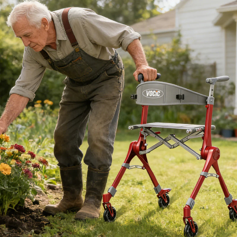 Man using a red and gray VOGC product in a garden