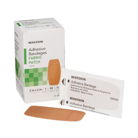 McKesson adhesive bandages with packaging on a white background