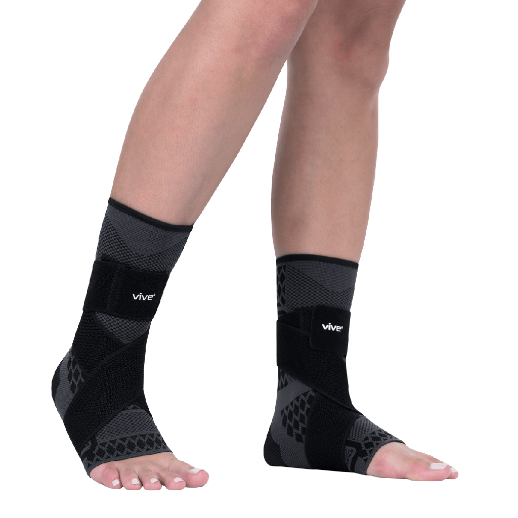 Black ankle support sleeves with 'vive' branding on a transparent background