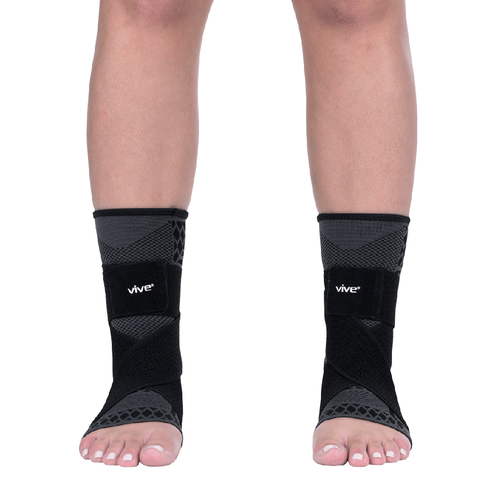 Black ankle support sleeves with 'vive' branding on a transparent background