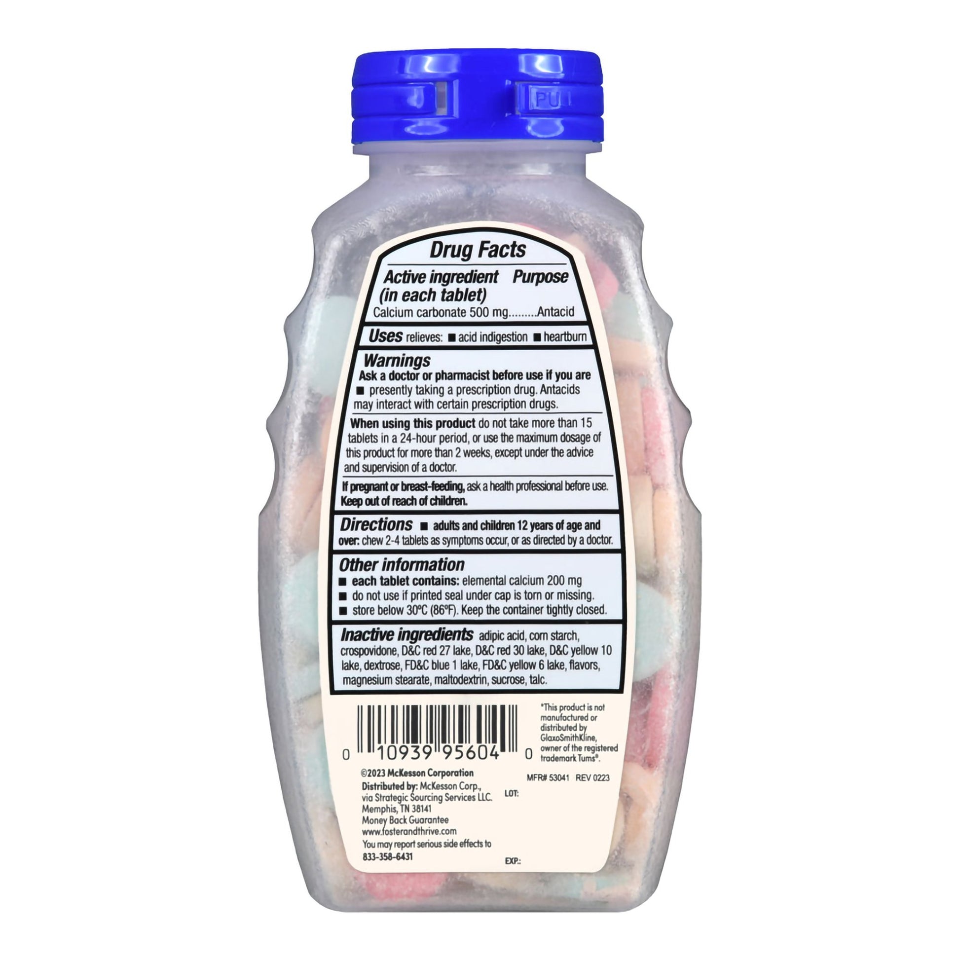 Bottle of vitamins with a blue cap and label on a white background