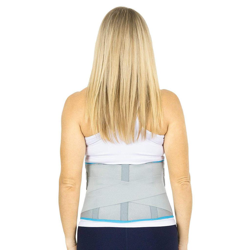 Person wearing a back brace on a white background