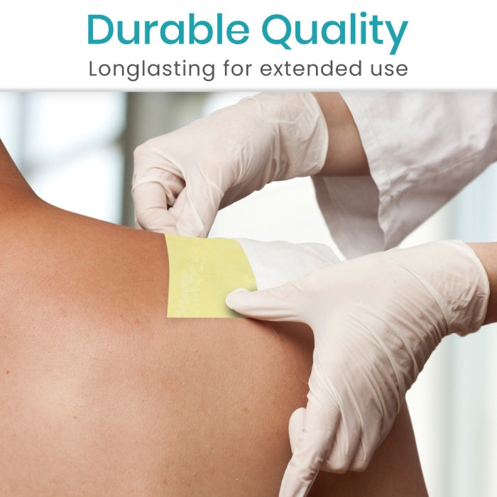 Person applying a yellow bandage to a person's arm with text 'Durable Quality' and 'Longlasting for extended use'.