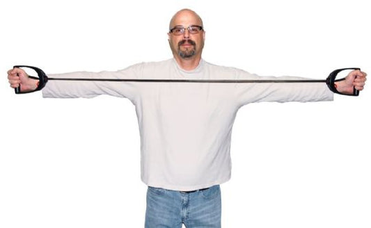 Man wearing a white shirt with extended sleeves on a white background