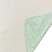 Light green fabric on a beige background