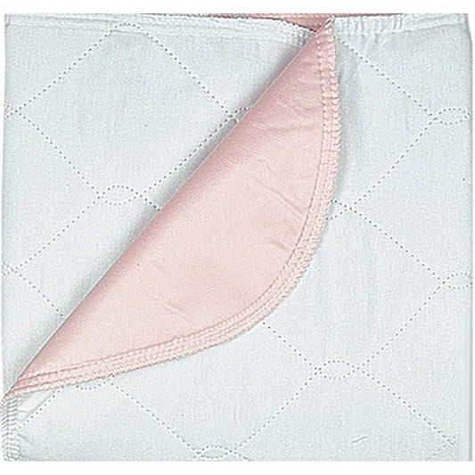 Quilted fabric with pink corner on a white background