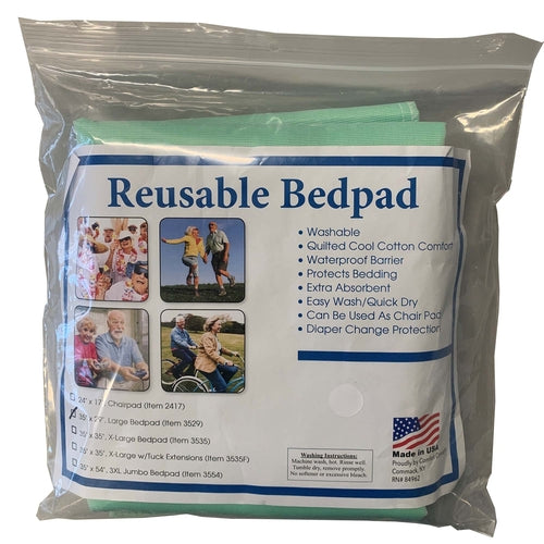 Packaged reusable bedpad with features and images on the label