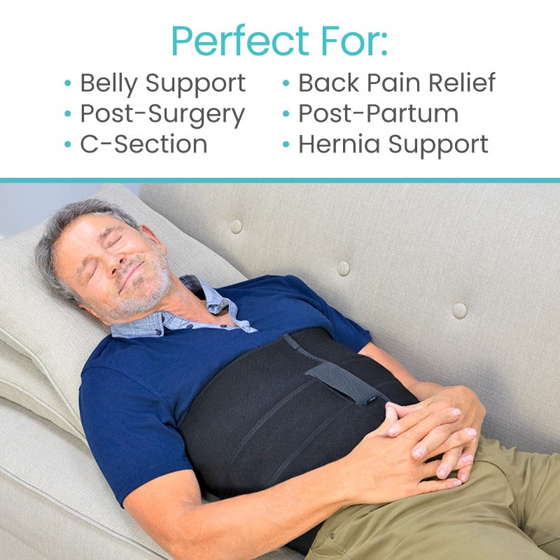 Man lying on a couch wearing a belly support belt with text indicating uses.