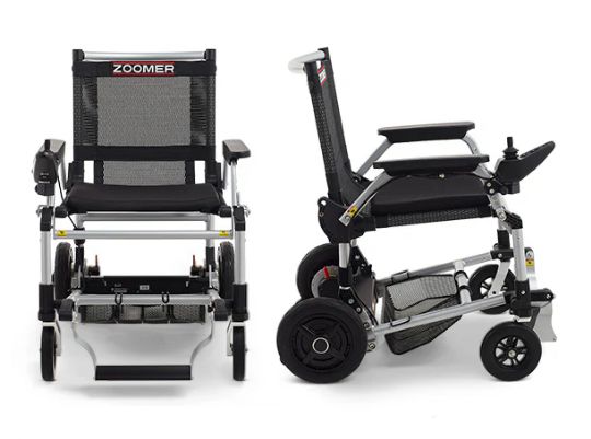 Two Zoomer electric wheelchairs on a white background