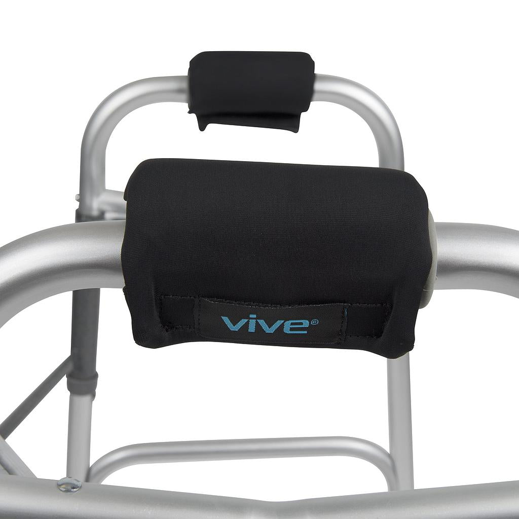 Black armrest covers with 'vive' branding on a walker frame.