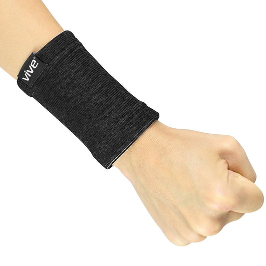 Black wrist support brace on a person's wrist with 'Vive' branding.