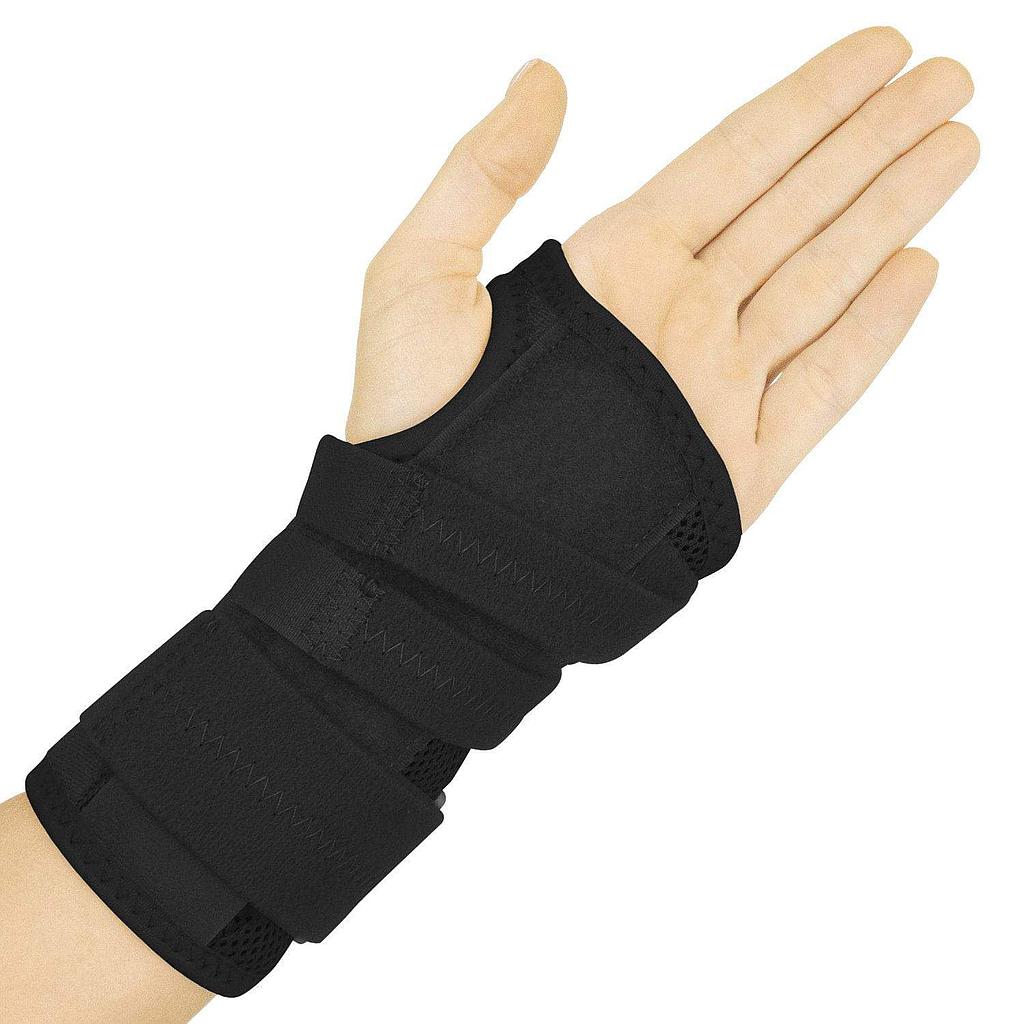 Black wrist support brace on a person's wrist against a white background